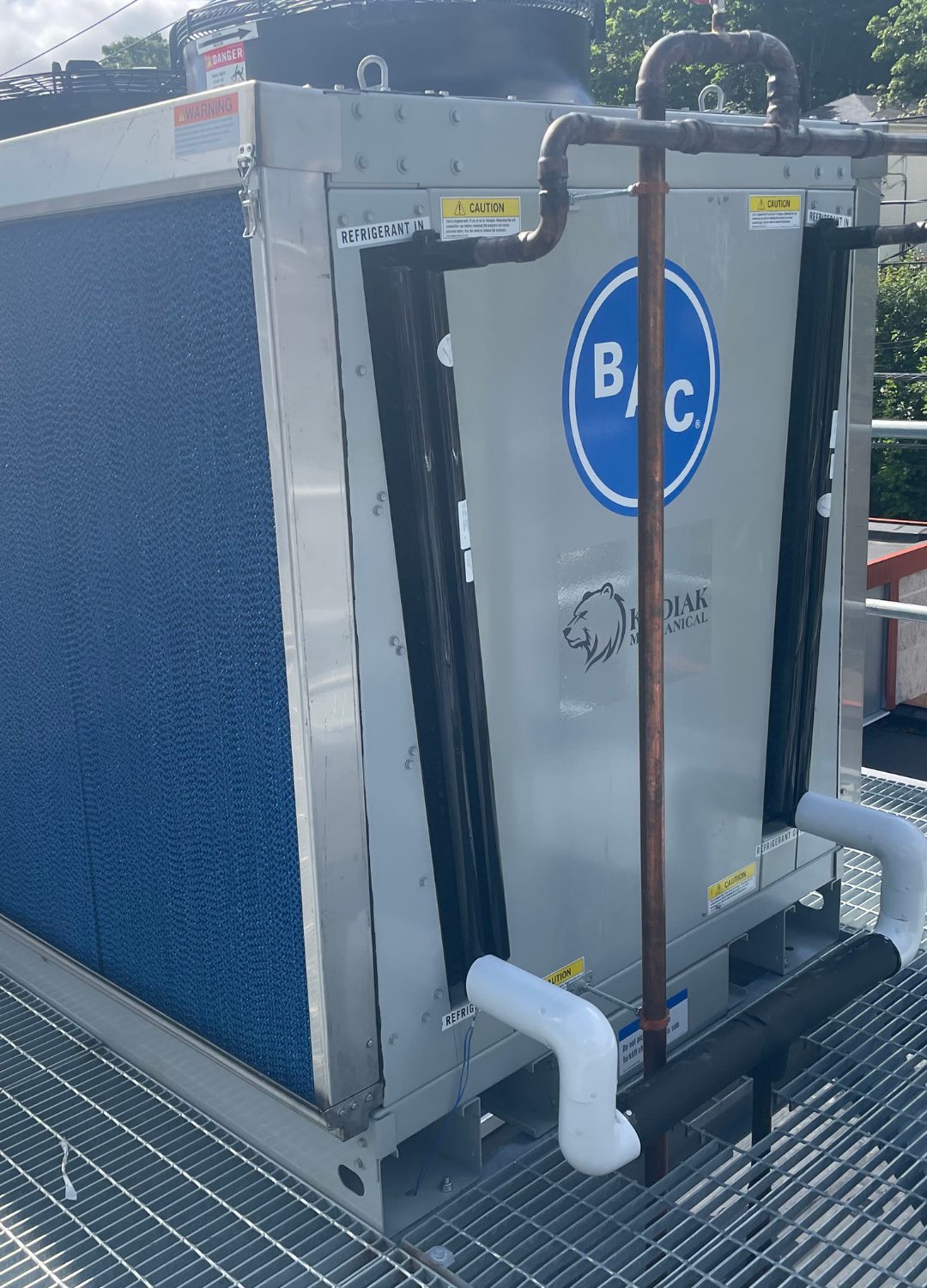 Close-up of a CO2 refrigeration condensing unit used in field troubleshooting